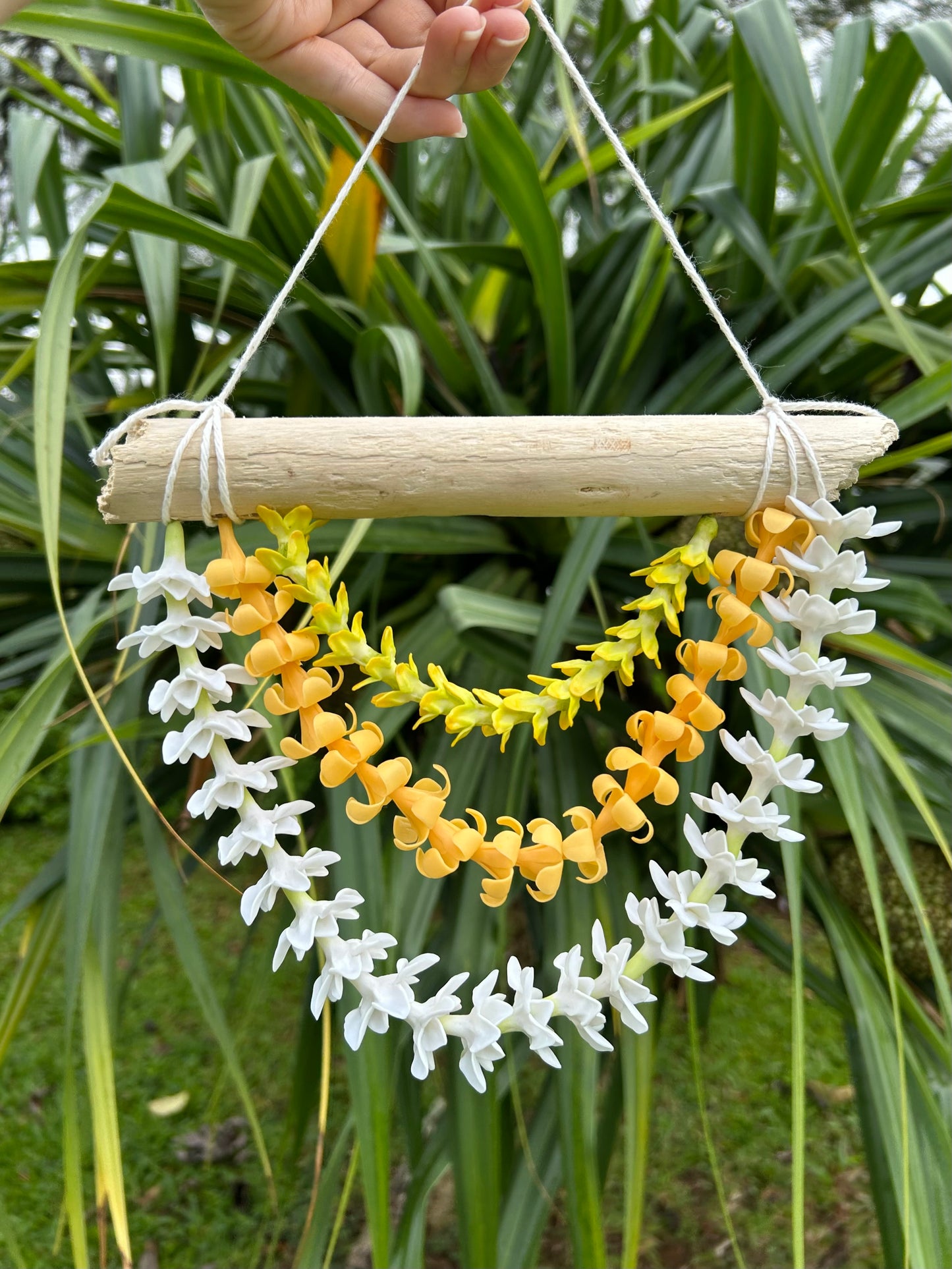 Clay Flower Lei Wall Decor
